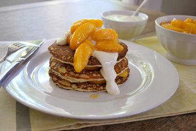 Pancakes with Peach Syrup and Yogurt Sauce