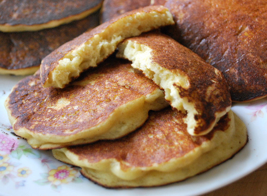 A stack of gluten-free pancakes made with Pamela's 1:1 All-Purpose Flour