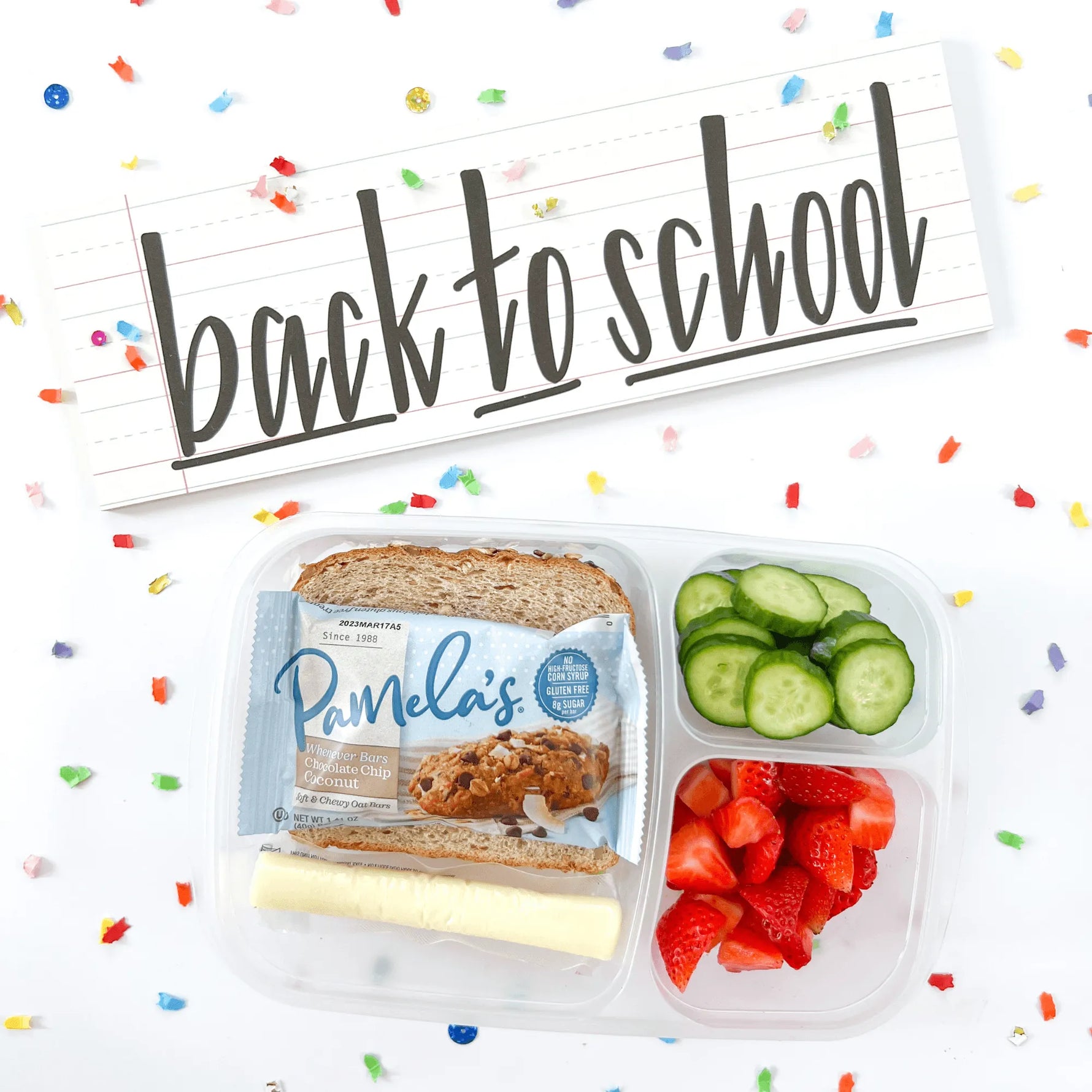 Packed lunch with Pamela's products on a white background with 'back to school' text.