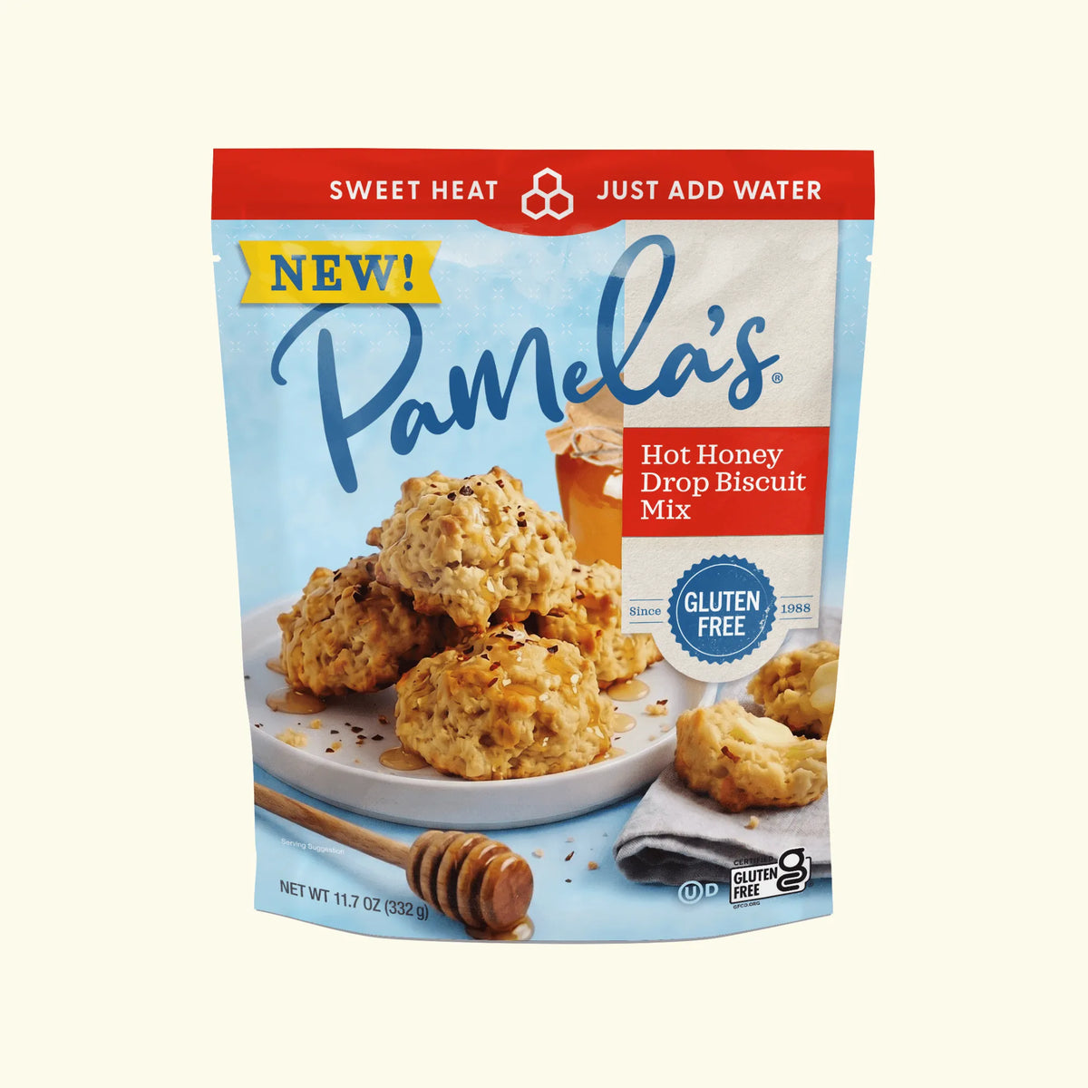 Pamela's Gluten-Free Hot Honey Drop Biscuit Mix, 11.7 oz package with golden gluten-free hot honey drop biscuits drizzled with honey